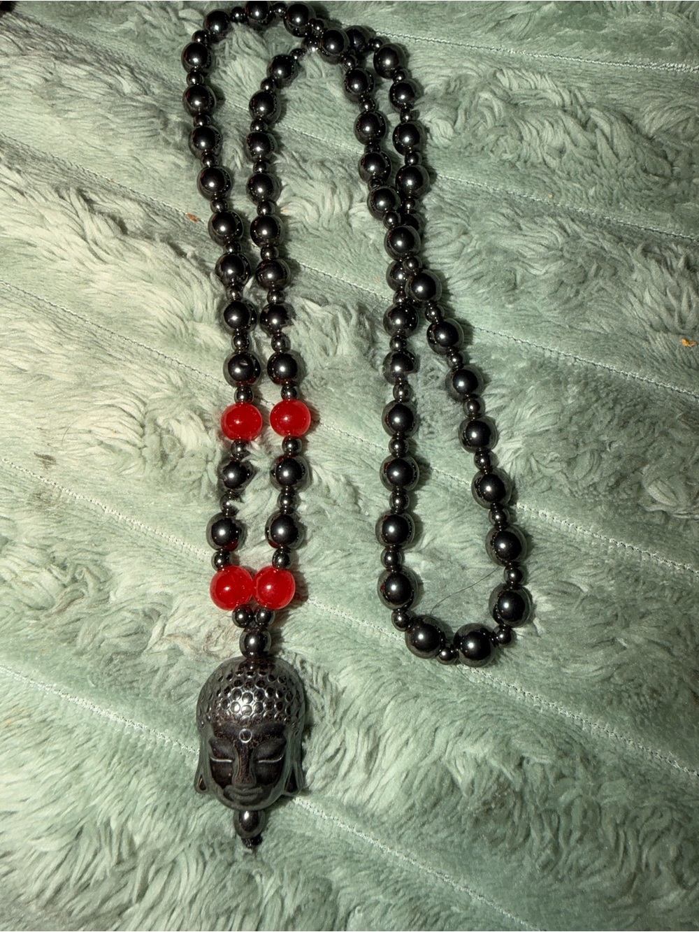 Black Hematite Bead Necklace with Red Accent and Buddha Pendant